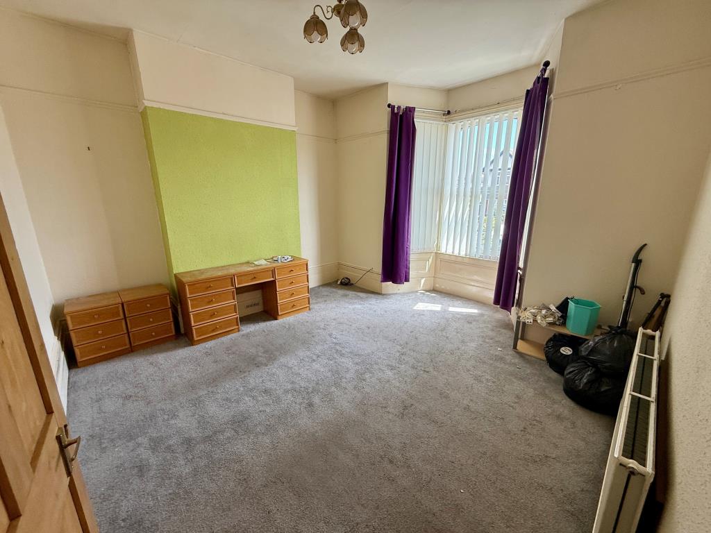Lot: 1 - FOUR-BEDROOM HOUSE FOR IMPROVEMENT - Living room with bay window